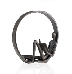 Iron Reader Sculpture